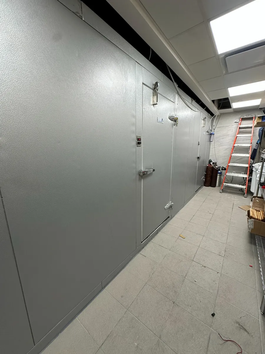 Insulated walk-in panel installation, finished clean